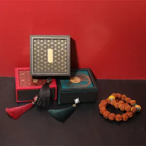 Vintage Chinese style jewelry boxes with hollow patterns and tassels for bracelets