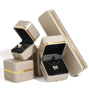 Set di scatole per gioielli in pelle PU oro champagne con bordo dorato e fodera in velluto nero