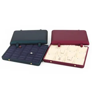 Large capacity jewelry display trays for rings and necklaces with double buckle design.