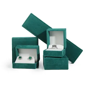 Elegant emerald green velvet jewelry box set for rings and earrings storage