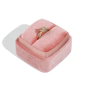 Elegant pink velvet ring box with rounded corners for premium jewelry gift storage