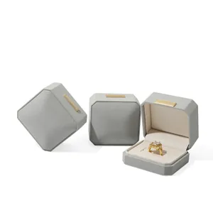 Elegant grey octagonal velvet jewelry gift boxes for rings earrings with gold accents