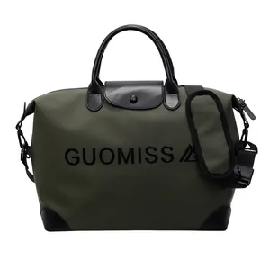 Large capacity olive green multifunctional travel duffel bag with black leather accents.