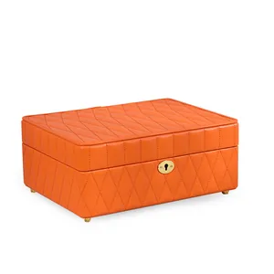 Luxurious large orange quilted leather jewelry organizer box with golden metal lock