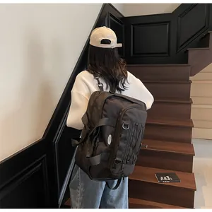 Black large capacity travel backpack with functional straps for outdoor activities