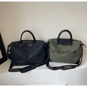Premium black and olive green large capacity travel bags with embossed letter design
