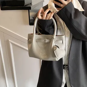 Elegant minimalist lychee grain texture bucket handbag for women in solid grey color
