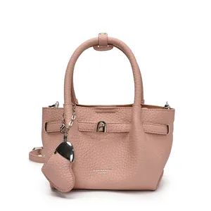 Elegant pink litchi pattern leather bucket bag with top handle and crossbody strap