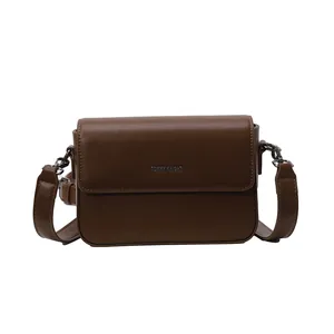 Vintage brown small square bag for women with Tommy Knight brand detail