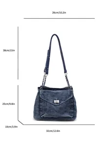 Dimension diagram of a vintage blue denim shoulder bag with measurements in cm and inches.