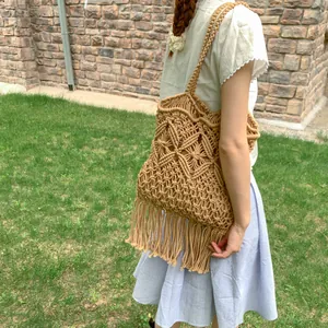 Handmade beige macrame fringe tote bag with hollow out design in bohemian style