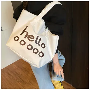 Bolsa tote de lona blanca con estampado 'hello' para el uso diario y el trabajo