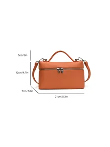 Detalle de dimensiones de bolso de cuero PU naranja, 21 cm de largo y 12 cm de alto