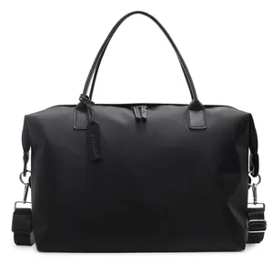 Durable black large capacity travel duffle bag for sports fitness and weekend trips