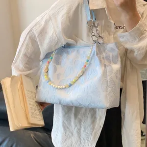 Sweet light blue tote bag with heart pattern and colorful beaded shoulder strap for women