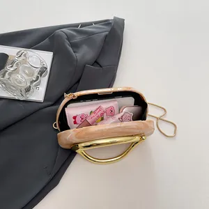 Vintage marble texture round evening clutch with gold metal handle and chain