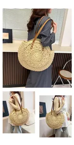 Detailed view of a woman carrying a stylish round hollow straw-woven shoulder beach bag