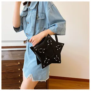 Stylish black star shaped crossbody bag for women featuring punk style silver studs