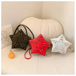 Group of star-shaped crossbody bags in black, red and silver displayed together.