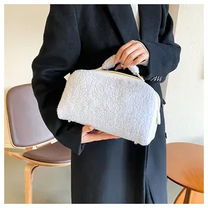 Fashionable white plush makeup bag with sturdy handle shown in a lifestyle photo