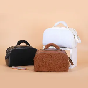 Stylish fuzzy teddy fleece cosmetic bags in multiple colors with convenient top handles