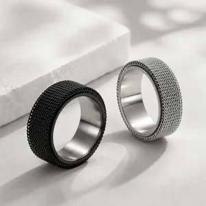 Detailed view of black and silver rotatable mesh stainless steel spinner rings