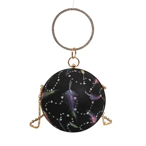 Elegante schwarze kugelförmige Abendtasche mit Federdruck und Strassgriff