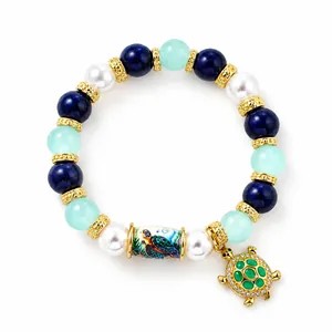 Mythical Ocean themed beaded bracelet with sea turtle charm and colorful pearls