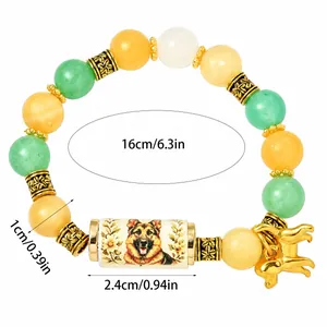 Detail of multi-color beaded bracelet featuring German Shepherd print and dog charm