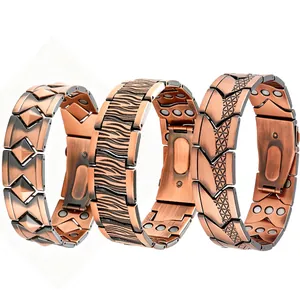 Detail showing three vintage copper magnetic bracelets with different textures and patterns.