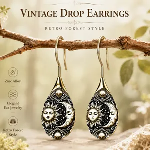 Vintage teardrop earrings with celestial sun and moon design in retro forest style