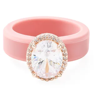 Elegante anello in silicone rosa per donna con grande zirconia ovale e montatura halo
