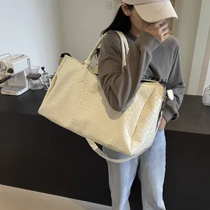 Large off-white woven texture travel duffel bag for women's short weekend trips and gym