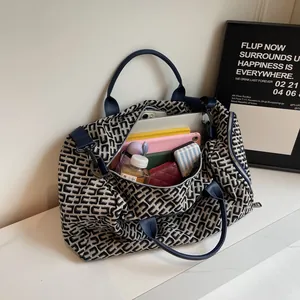Sac de voyage élégant pour femmes à motif géométrique et grande capacité de rangement