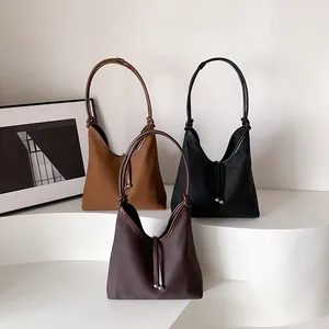 Minimalist large capacity hobo tote bags for women in stylish black and brown commuting colors