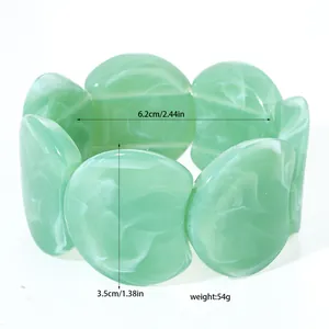 Detailed view of green marbled resin bracelet with dimensions and weight info