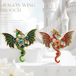 Detailed view of punk mechanical dragon brooches with vintage enamel and gear motifs