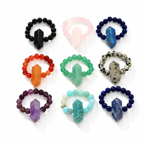 Collection of assorted natural stone beaded rings featuring hexagonal crystal pillars