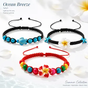 Détail de l'ensemble de bracelets de cheville d'été faits main avec fleur et tortue