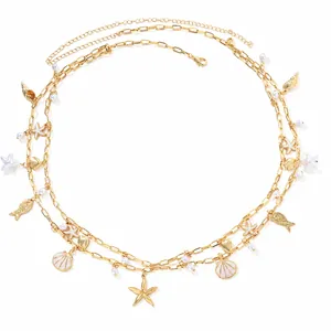 Gold ocean style waist chain with sea stars shells and pearls for beach vacation