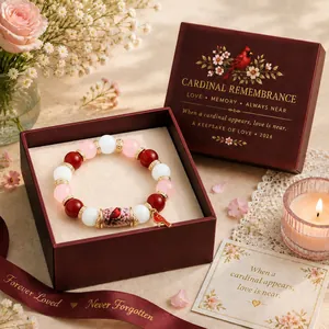 Beaded cardinal remembrance bracelet with luxury red gift box and keepsake card.
