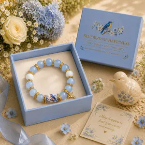 Bluebird of Happiness beaded elastic bracelet with matching light blue gift box.