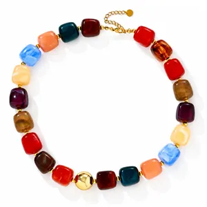 Vibrant colorful acrylic beaded necklace featuring marbled square beads and a gold accent