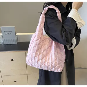 Stylish pink pleated shoulder tote bag with crinkle texture for casual work commute