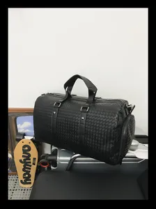 Sac de voyage noir à texture tressée de grande capacité pour les déplacements pro