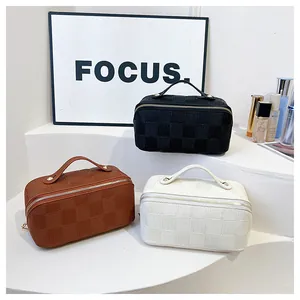 Set of three premium checkered square makeup bags in black, brown, and white colors