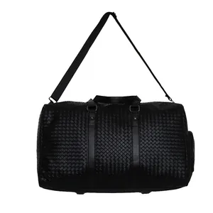 Sac de voyage en cuir tressé noir de grande capacité pour les affaires et le sport.