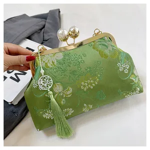 Bolso de mano bordado estilo chino vintage verde con cierre de perla y borla
