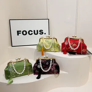 Elegante bolso vintage de estilo chino bordado con asa de perlas y cadena dorada larga