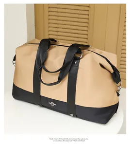 Spacious two-tone khaki and black travel duffle bag for women's short-distance trip
